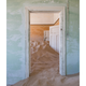 Illustration for article titled Colorful Desert Ruins Consumed by Waves of Sand